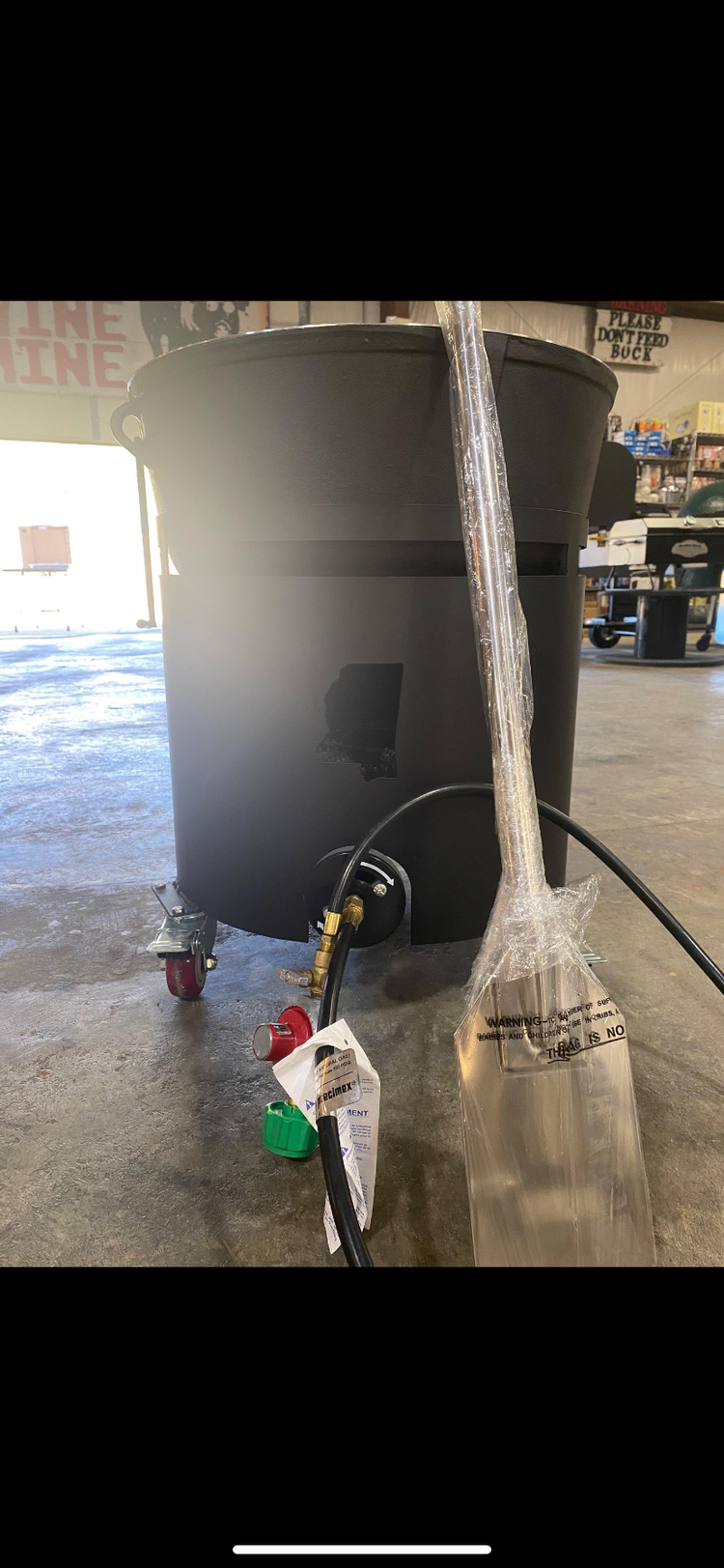 20 Gallon Windproof Steel Roll Around Combo with wheels and gas regulator perfect for outdoor grilling and BBQ enthusiasts.