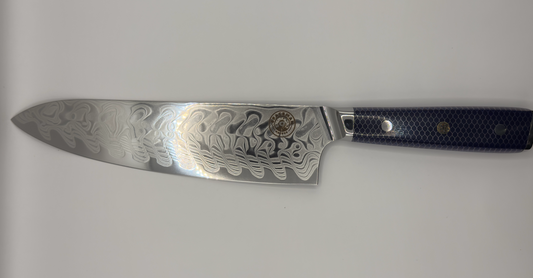 Spaceman Interstellar Blue - Chef knife with a stunning 67-layer Damascus finish for precision cooking.