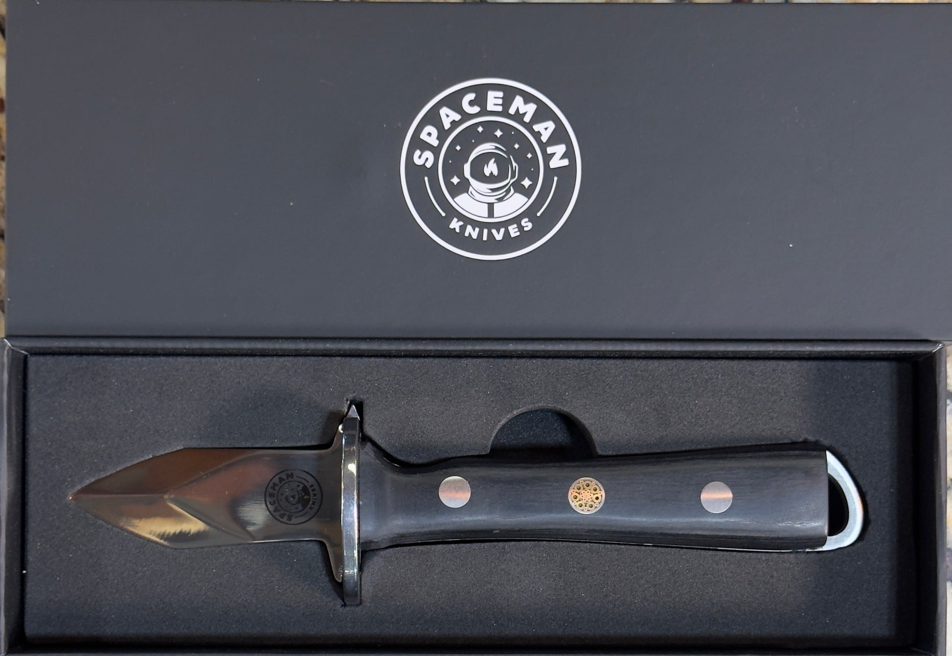 Spaceman Oyster Shucker Knife in a sleek box, perfect for grilling and outdoor BBQ enthusiasts.