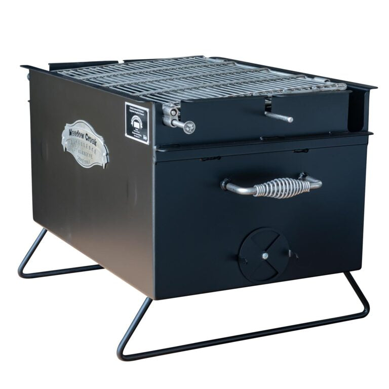 Meadow Creek BBQ26 Chicken Cooker is ideal for camping and backyard entertaining with features for grilling and cooking.