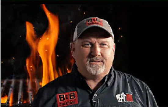 World-class pitmaster Mark Lambert shares BBQ tips with fiery grill background, showcasing grilling expertise and BBQ lifestyle.