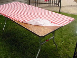 KwikCover 8' fitted table cover in red and white checkered design on an outdoor table, perfect for BBQ events.