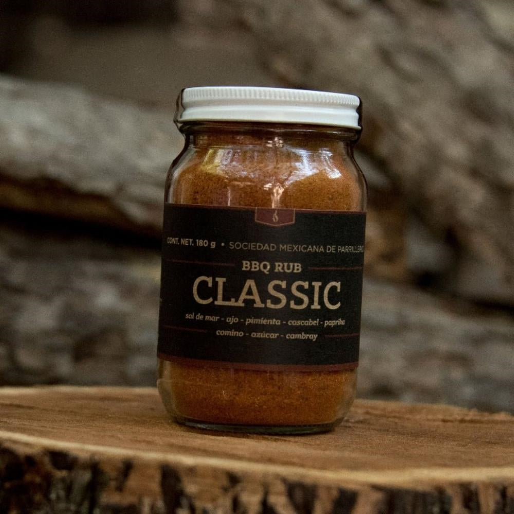 SMP rub in a jar labeled BBQ rub Classic, perfect for enhancing smoked pork ribs on grills and smokers.