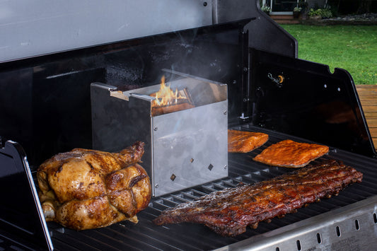 Diamond King 6x6 BBQ Smoke Box in action, adding flavor to chicken, ribs, and fish on a grill.