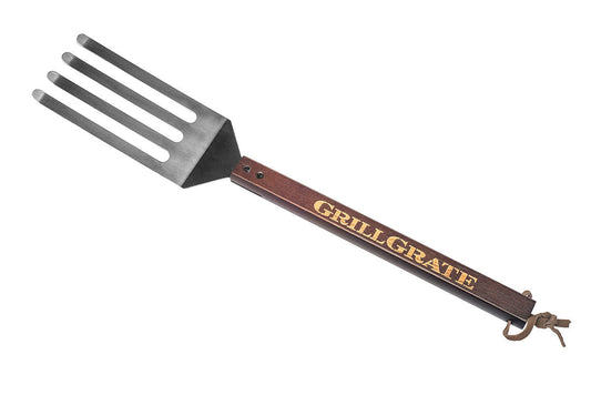 GrillGrate Tool for outdoor grilling, part fork and spatula, perfect for cleaning grills and smokers.