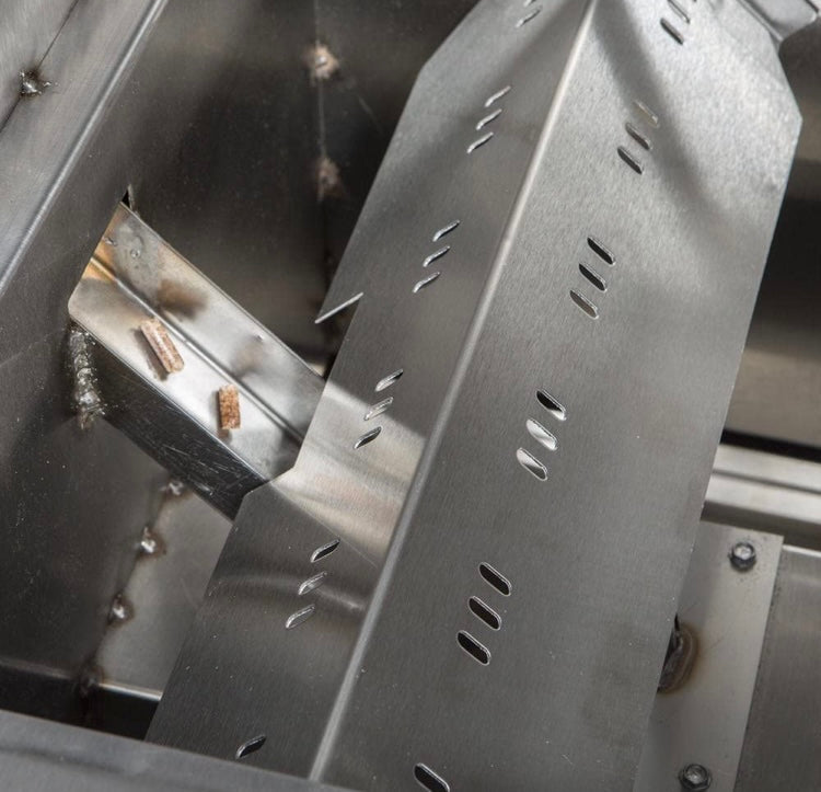 Interior mechanism of Cookshack PG500 Fast Eddy's Pellet Grill showcasing stainless steel construction and precision design.