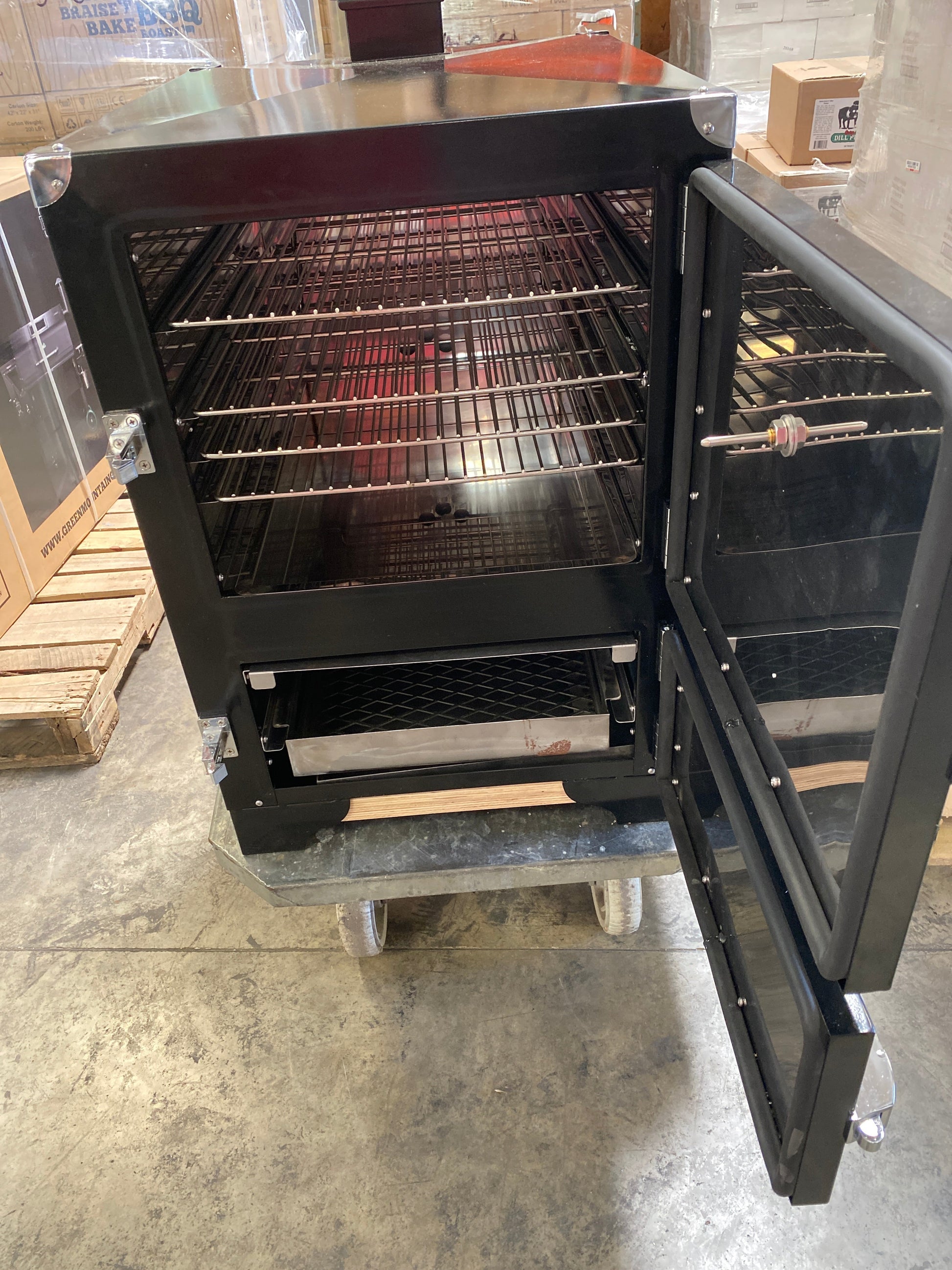Backwoods smoker chubby G3 with stainless steel cooking chamber and deeper racks for competition BBQ.
