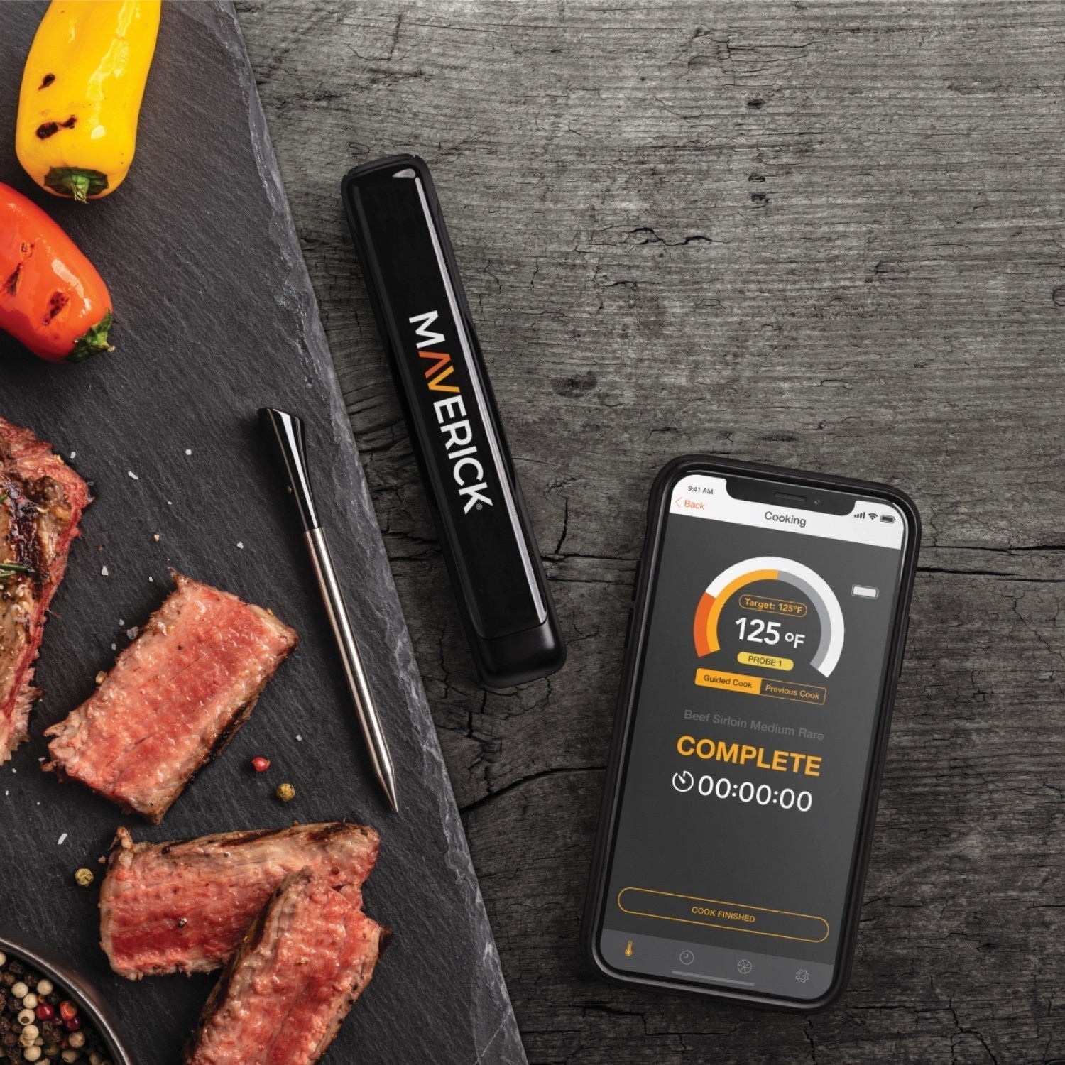 Stake maverick thermometer shown with smartphone app reading, ideal for grills smokers and cookers recipes BBQ.
