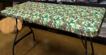 KwikCover 6’ Camouflage fitted table cover with elastic, perfect for BBQ and outdoor gatherings.
