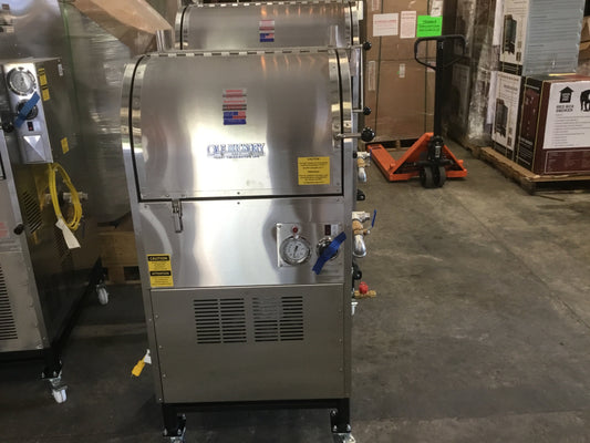 Ole Hickory Ace JW Smoker Polished Stainless Finish showcased in a warehouse, ideal for competition BBQ cooking.