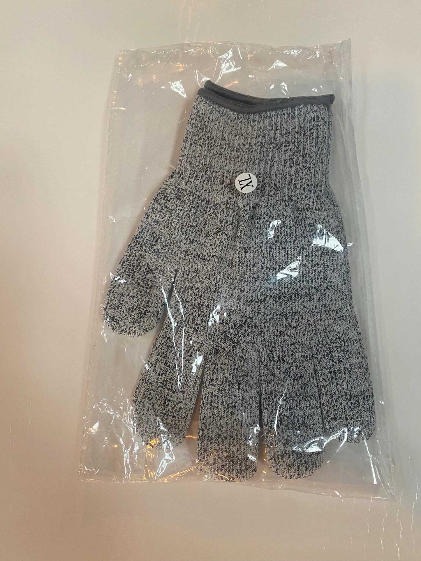 Cut resistant glove packaged, perfect for outdoor grilling, BBQ, and using with grills, smokers and cookers.