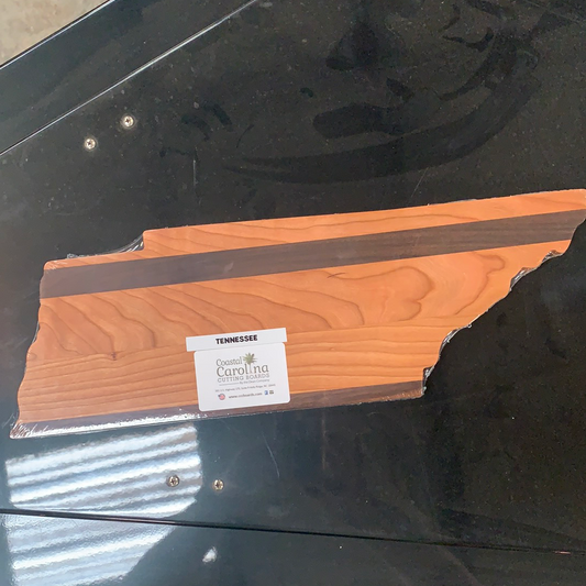 Coastal Carolina Cutting Boards - Tennessee with wood grain surface and label on black background, ideal for outdoor grills and BBQ.
