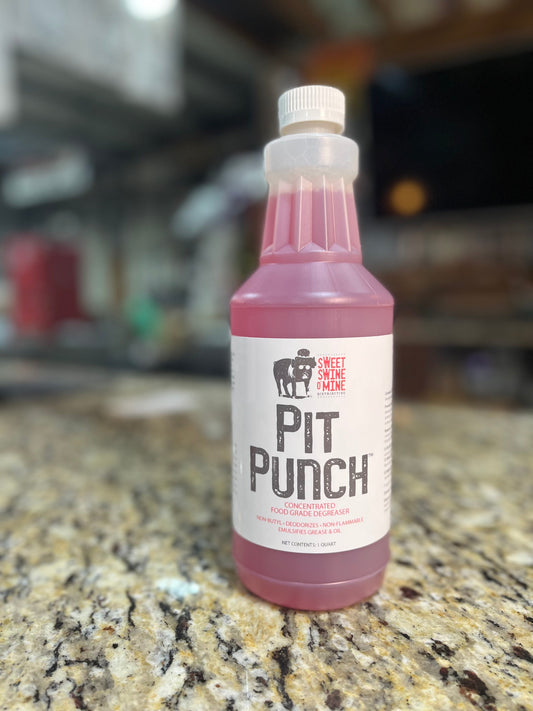 Pit Punch Quart Pit Cleaner on a granite surface, perfect for maintaining grills smokers and cookers.