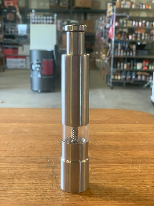 Spice Grinder with push button thumb design perfect for kitchen, ideal for grilling recipes and BBQ cooking tools.