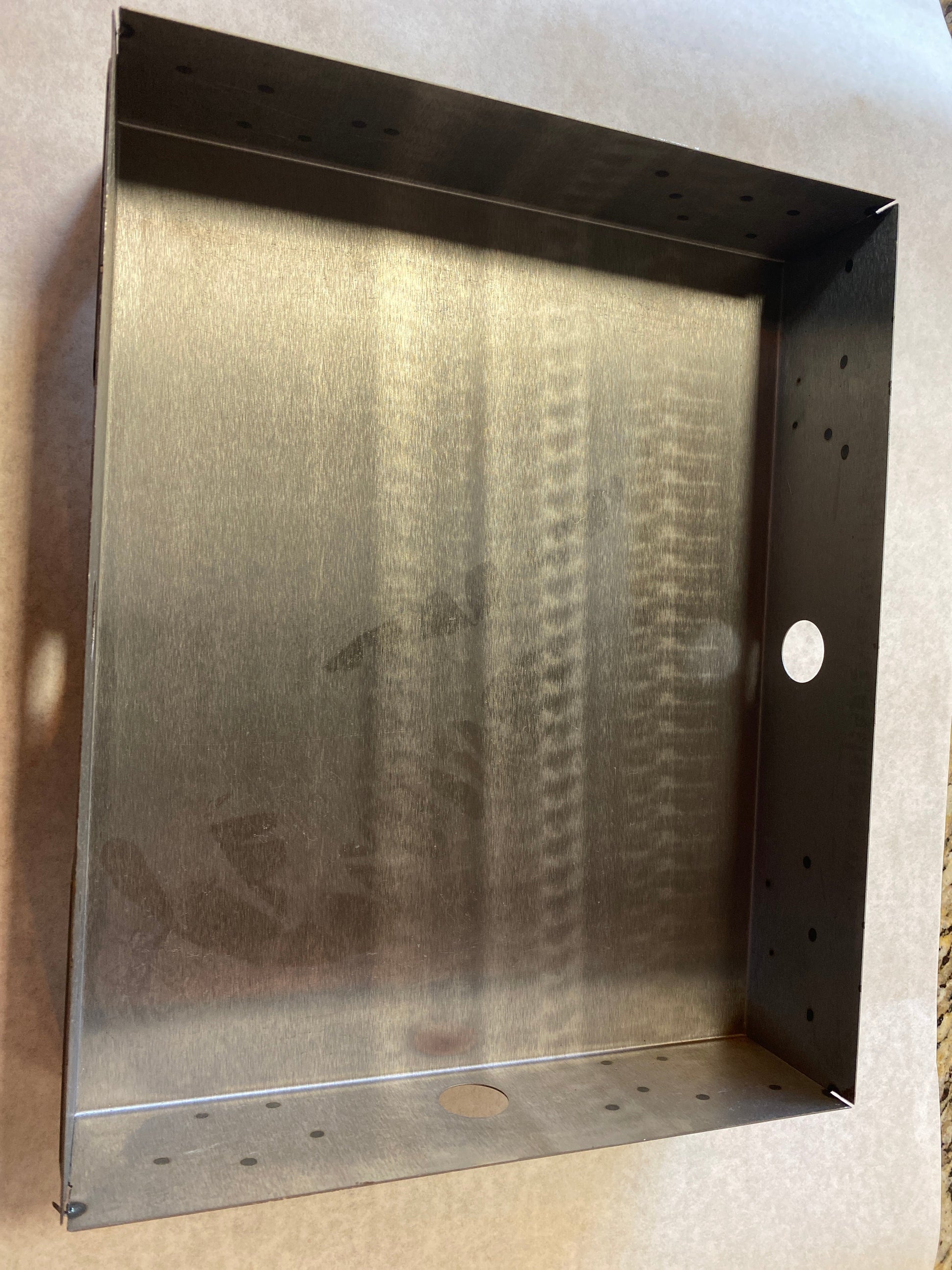 Red box smoker replacement fire pan for grills, smokers, and cookers, enhancing your outdoor barbecue experience.