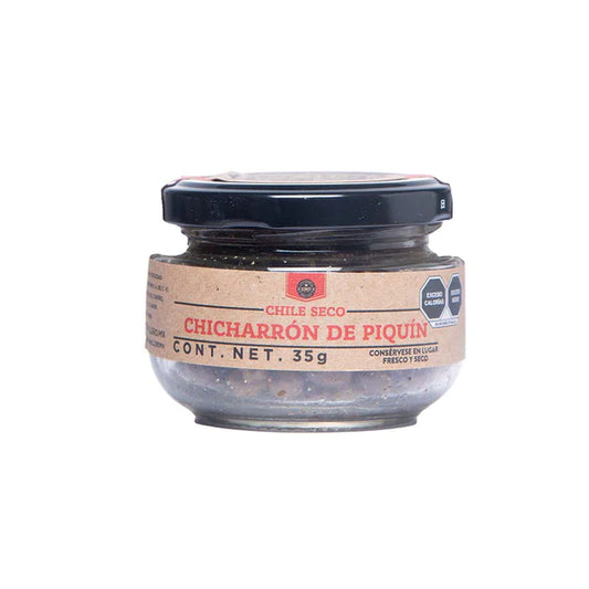 SMP Chicharron DE Piquin in a jar, great for topping grills smokers dishes and enhancing BBQ rub flavors.