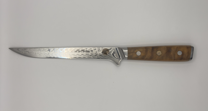 Spaceman Interstellar-Olive Boning Knife with a sleek Damascus steel blade and stylish wood handle for precision cooking.