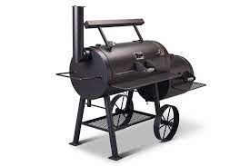 Yoder loaded Wichita offset smoker with charcoal grates, heat plate, and dual thermometers for outdoor grilling.