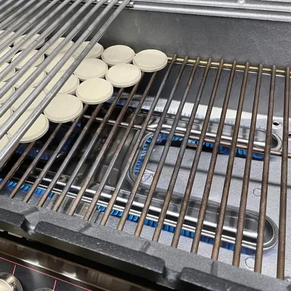 MHP 4 Gen Series Gas Grill cooking area featuring stainless steel grates and innovative burner design for outdoor grilling.