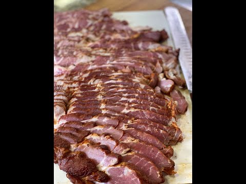 Sliced meat seasoned with Sweet Rub O' Mine Apple Chipotle BBQ Rub, perfect for grilling on charcoal grills or pellet smokers.