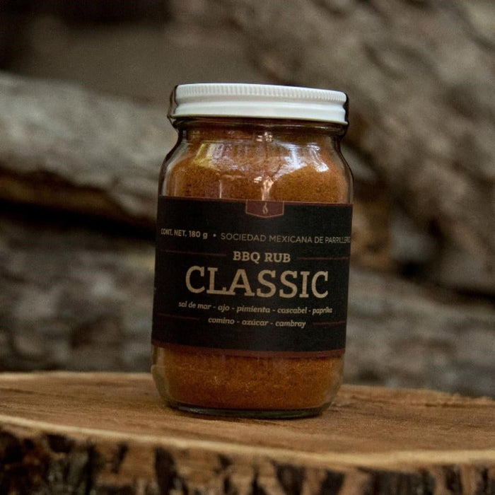 SMP rub in a jar labeled BBQ rub Classic, perfect for enhancing smoked pork ribs on grills and smokers.