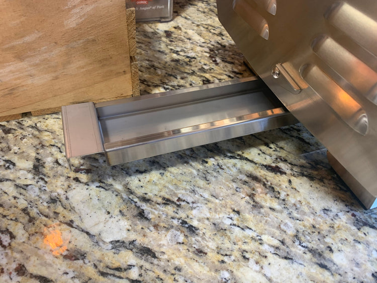 Blaze PRO Portable Grill LP Gas showing durable stainless steel components on a granite countertop, perfect for outdoor grills and cooking tools.