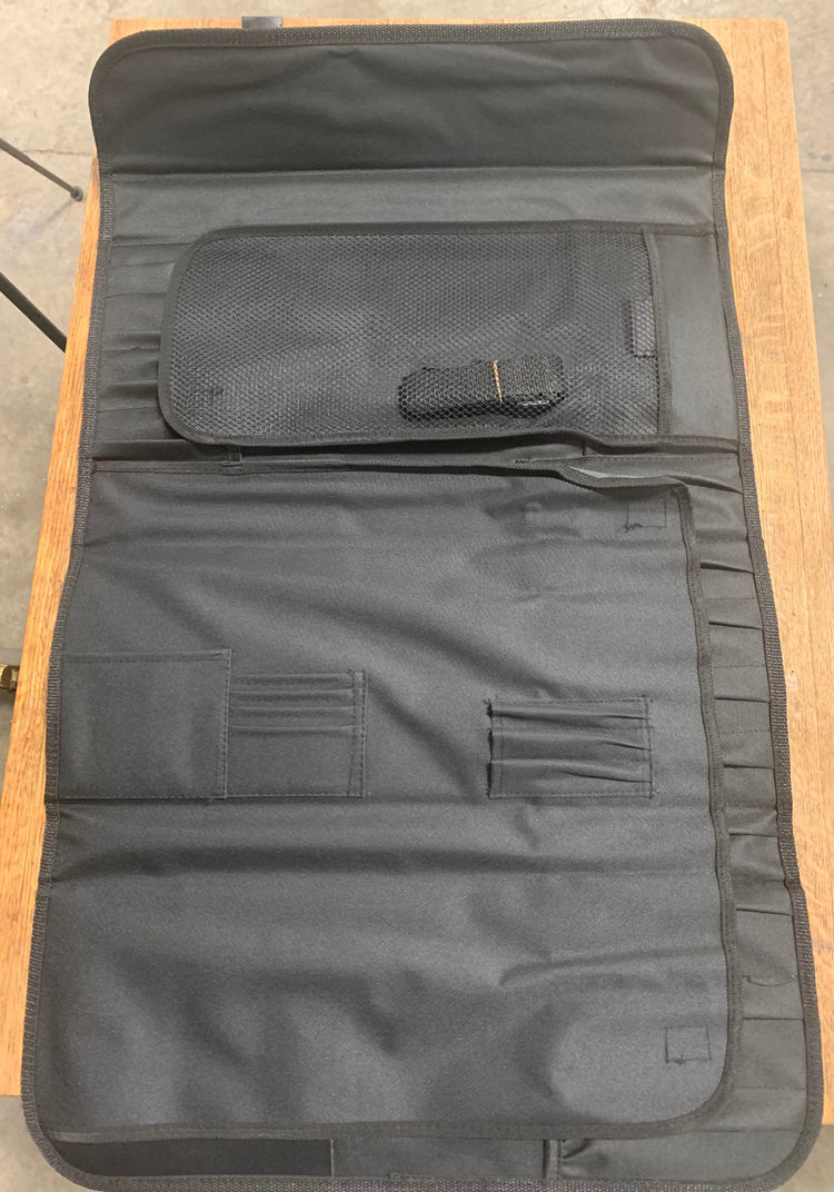 Advanced tri-fold hard case chef bag with multiple pockets for cooking tools and cutlery organization.