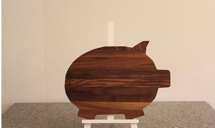 Coastal Carolina Cutting Boards Big Pig on display, perfect for outdoor grilling with grills smokers and cookers.
